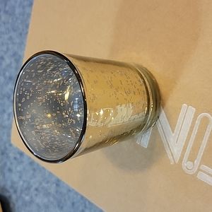 Case of 18 gold votive holders